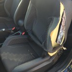 Black Car Seat Stitching Before Repair